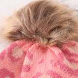 Pink pompom leopard cable beanie hat