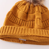 Mustard pompom cable beanie hat