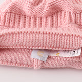 Pink pompom cable beanie hat